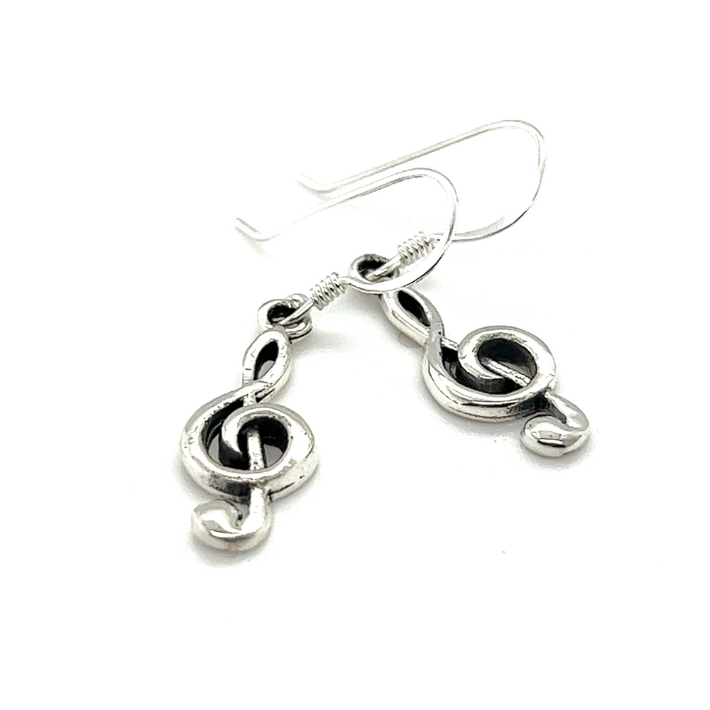 Musicians will adore these elegant Super Silver Treble Dangling Earrings. The perfect accessory for any music lover, these Treble Dangling Earrings are a stylish way to showcase your love for music.