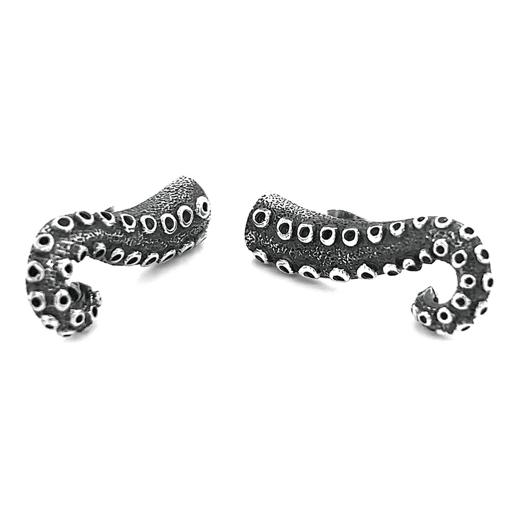 A pair of Edgy Octopus Tentacle Post Earrings by Super Silver on a white background, inspired by the deep sea.