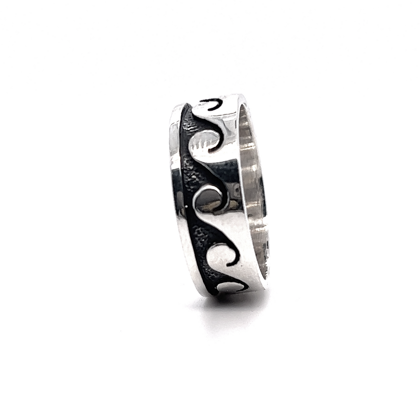 
                  
                    A silver 8mm Wave Band with wave designs on it.
                  
                