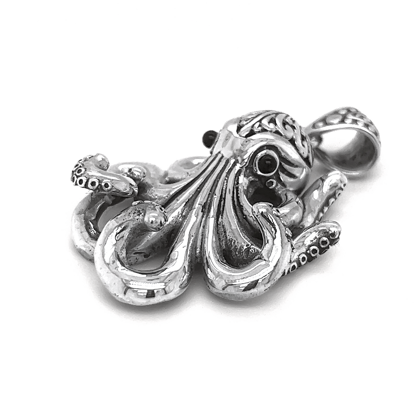 
                  
                    An exquisite silver Octopus Pendant representing the ocean's mysteries, showcased against a pristine white background.
                  
                