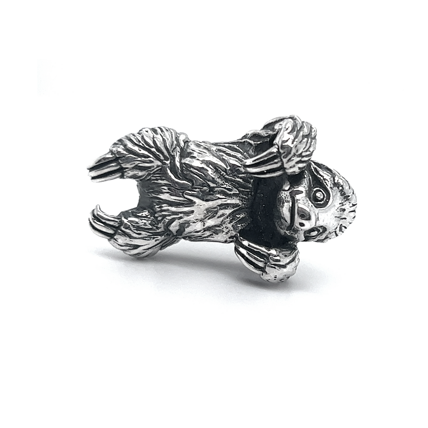
                  
                    A meticulously crafted silver ring featuring a whimsical Super Silver sloth pendant.
                  
                
