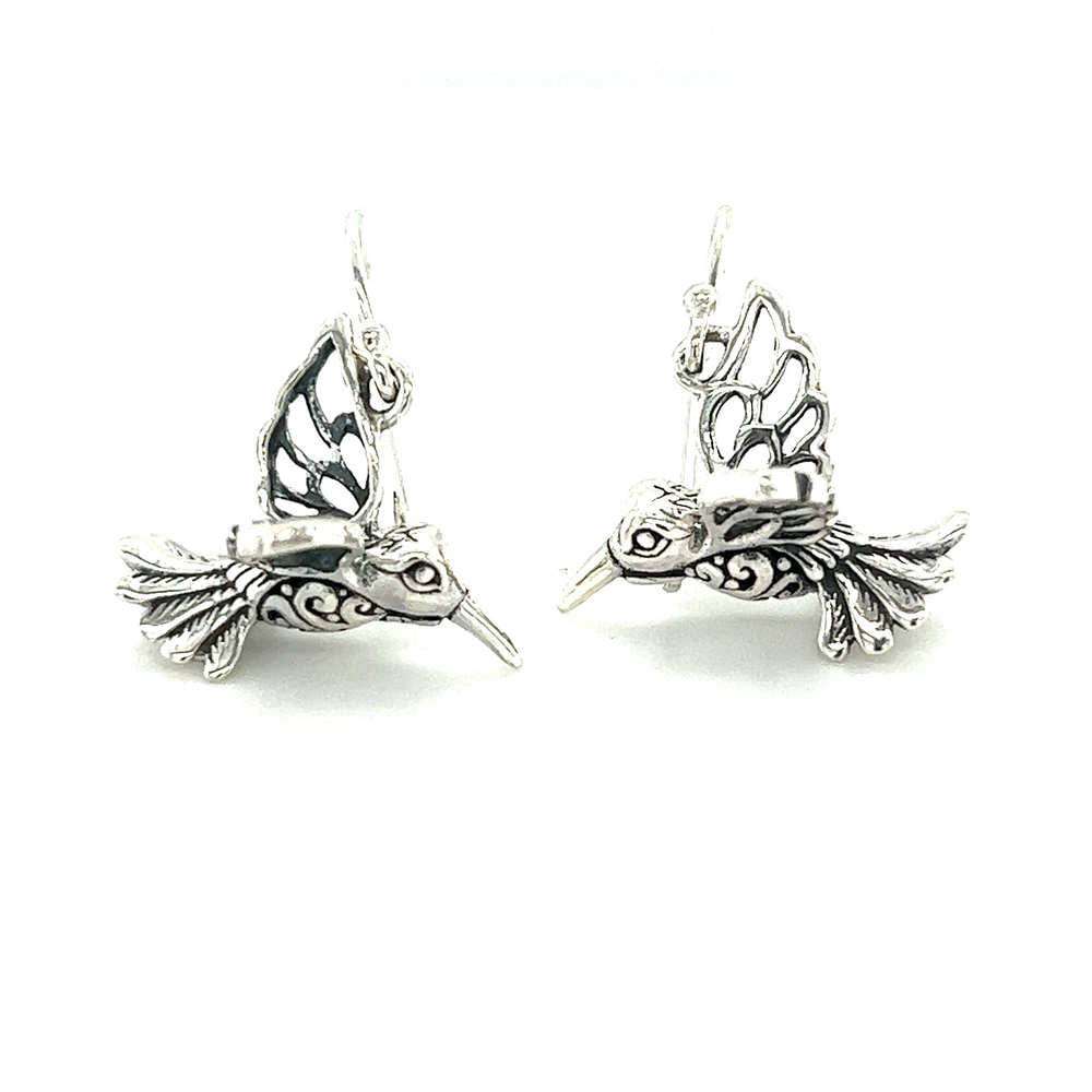 A pair of Super Silver Filigree Hummingbird Earrings on a white background.