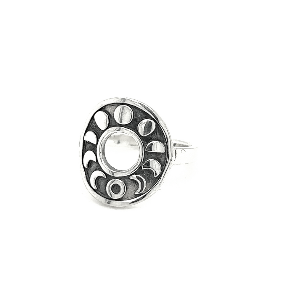 
                  
                    A Striking Circular Moon Phases Ring adorned with a mystical moon phase design made by Super Silver.
                  
                