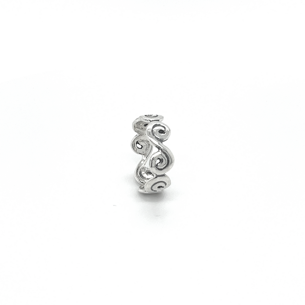 
                  
                    A freeform silver ring with a Wavy Swirl Band design.
                  
                