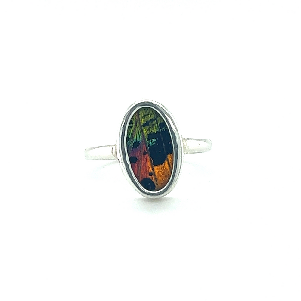 
                  
                    A Genuine Butterfly Wing Ring in Oval Shape with a vibrant and intricate design.
                  
                