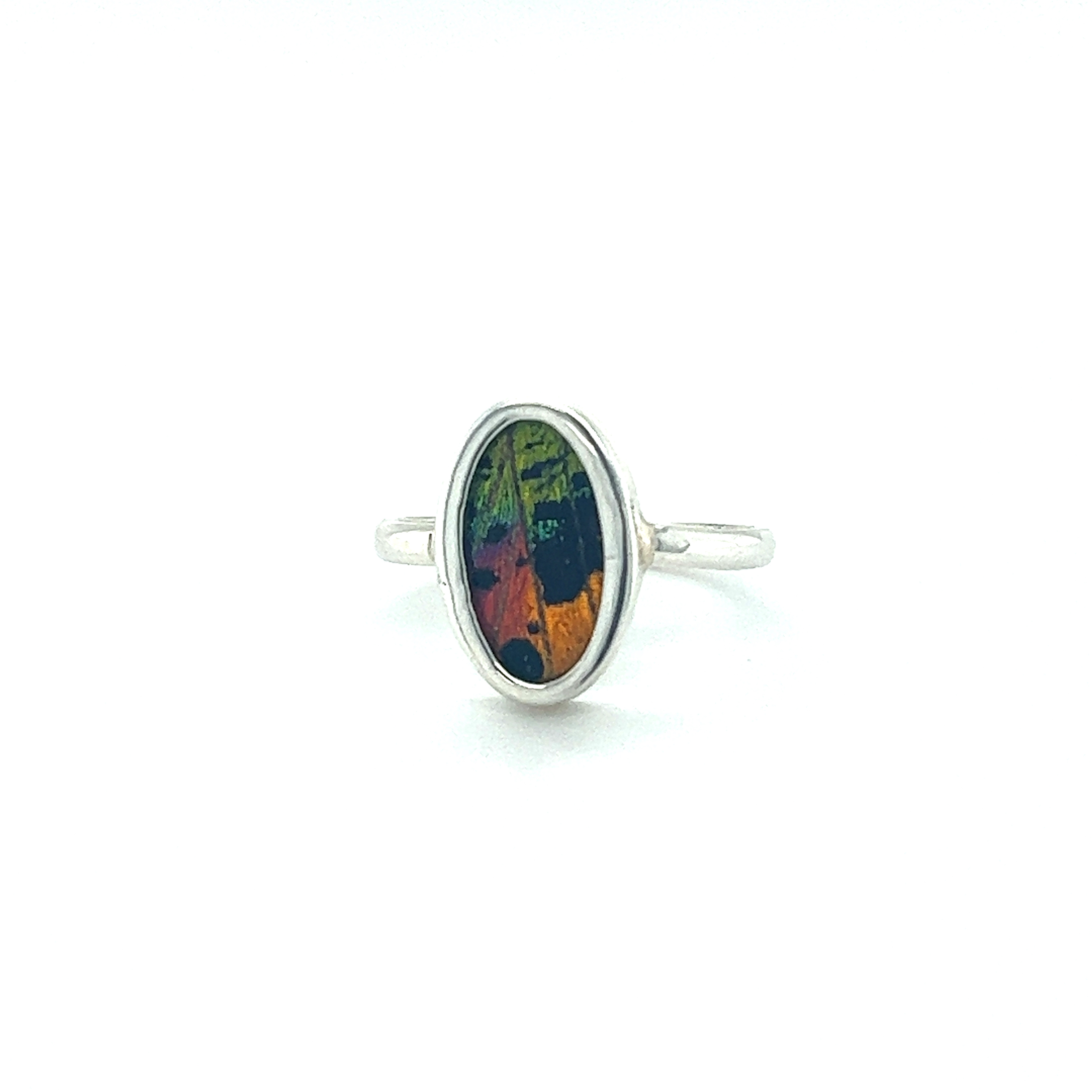 A vibrant and eye-catching Genuine Butterfly Wing Ring in Oval Shape featuring a stunning colorful stone.