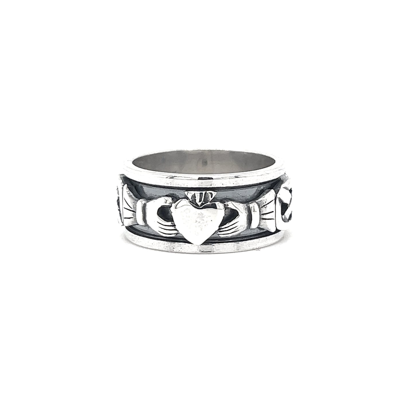 A Bold Claddagh Spin Ring with a heart on it.