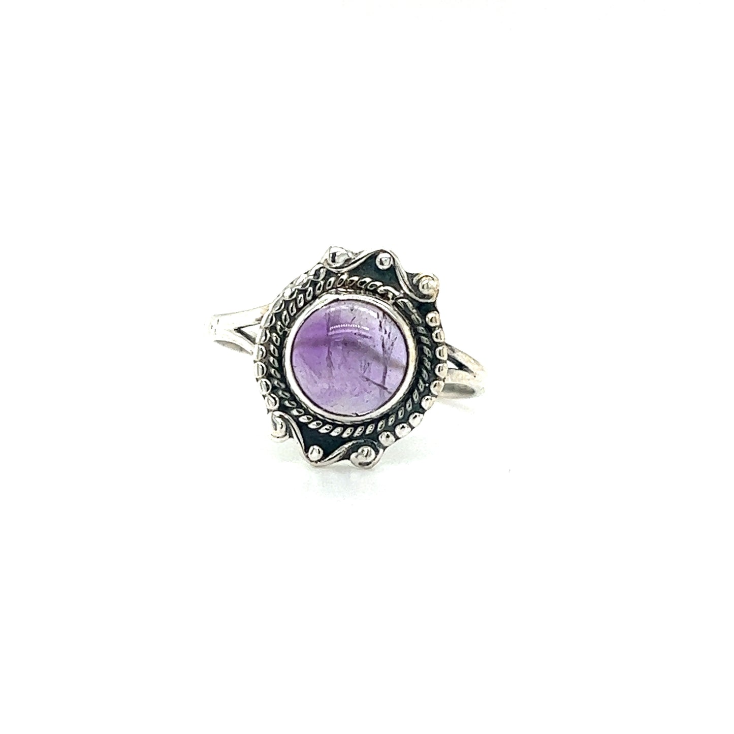 
                  
                    A Round Gemstone Ring With Vintage Setting featuring an ornate design and set with a round purple gemstone in the center, perfect for lovers of vintage-style gemstone rings.
                  
                