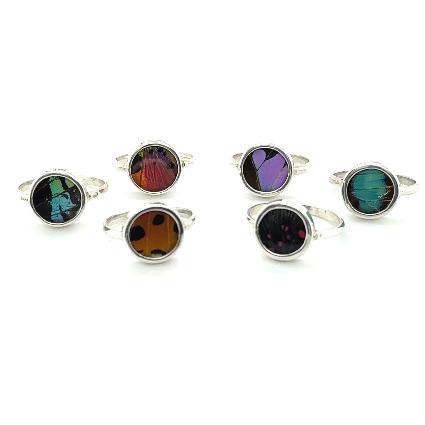 A set of Butterfly Wing Rings in Circle Shape with statement boho-inspired colored glass stones.