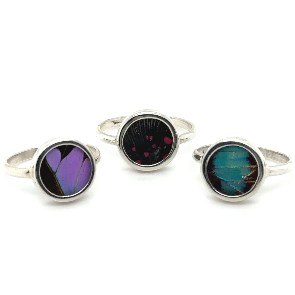 
                  
                    Three Butterfly Wing Rings in Circle Shape, perfect for adding a touch of Santa Cruz style to your jewelry collection.
                  
                