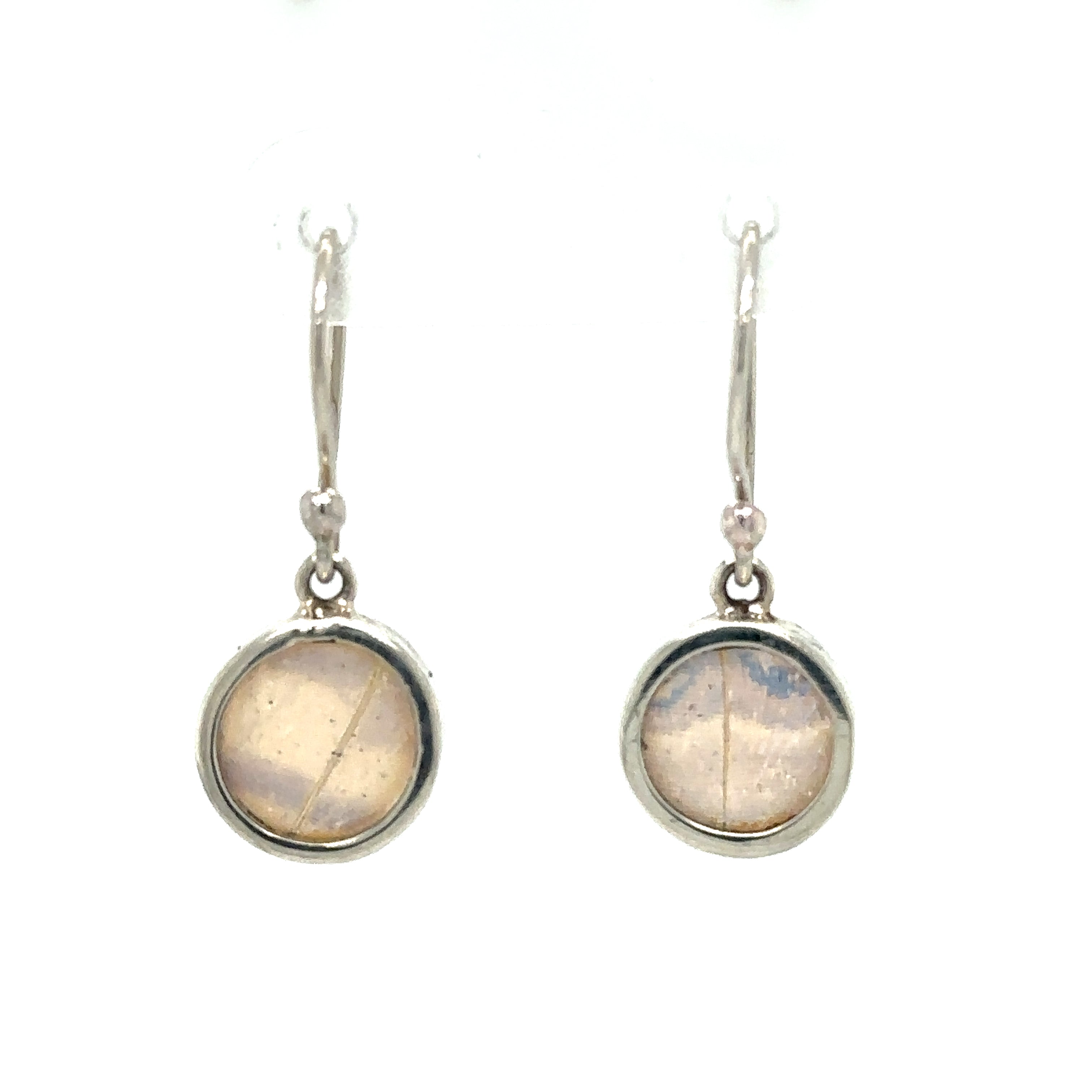 A pair of Small Butterfly Wing Earrings with a stone in the middle.