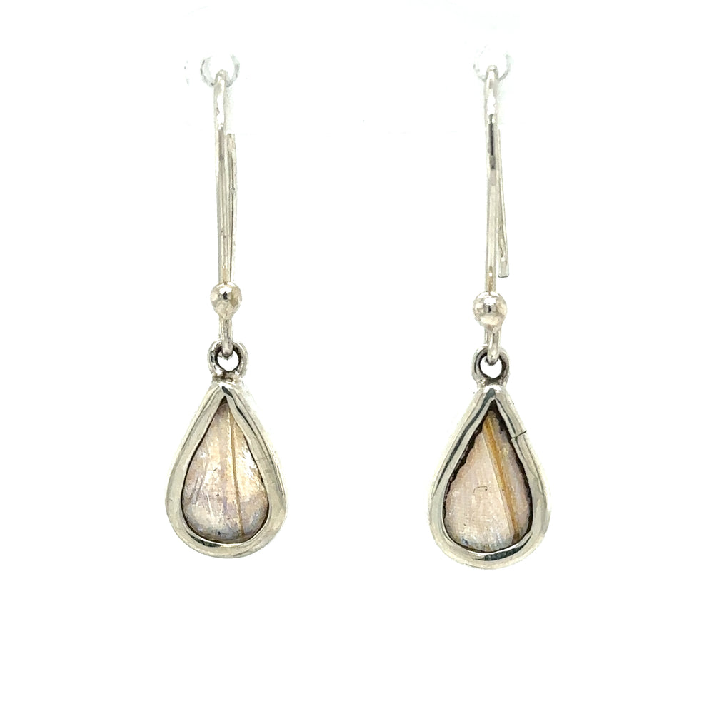 
                  
                    Description: A pair of Small Butterfly Wing Earrings with a tear-shaped labradorite stone.
                  
                