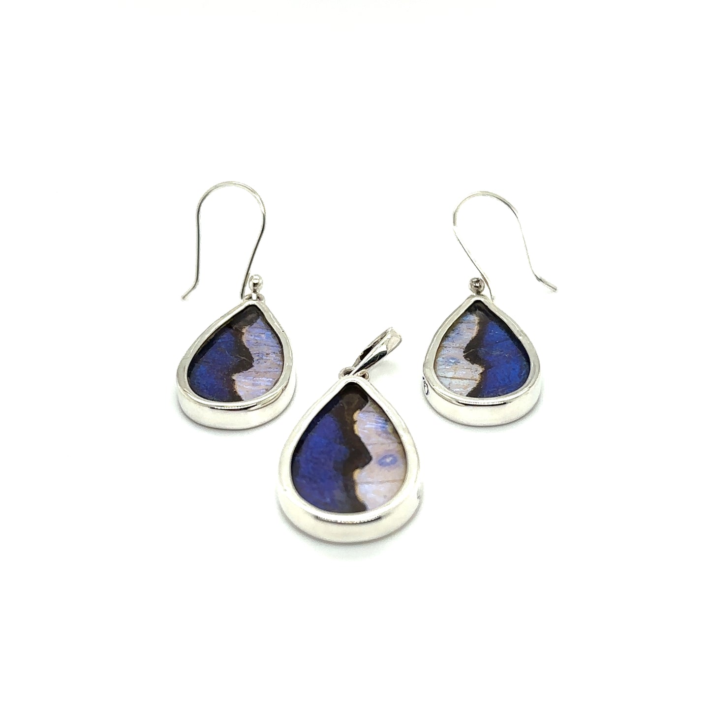 
                  
                    A pair of Genuine Butterfly Pendant and Earring Teardrop Set with a statement blue tear-shaped stone.
                  
                