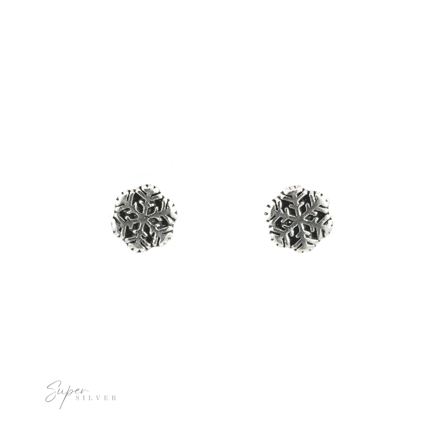 
                  
                    A pair of silver Snowflake Studs with snowflake motifs on a white background.
                  
                
