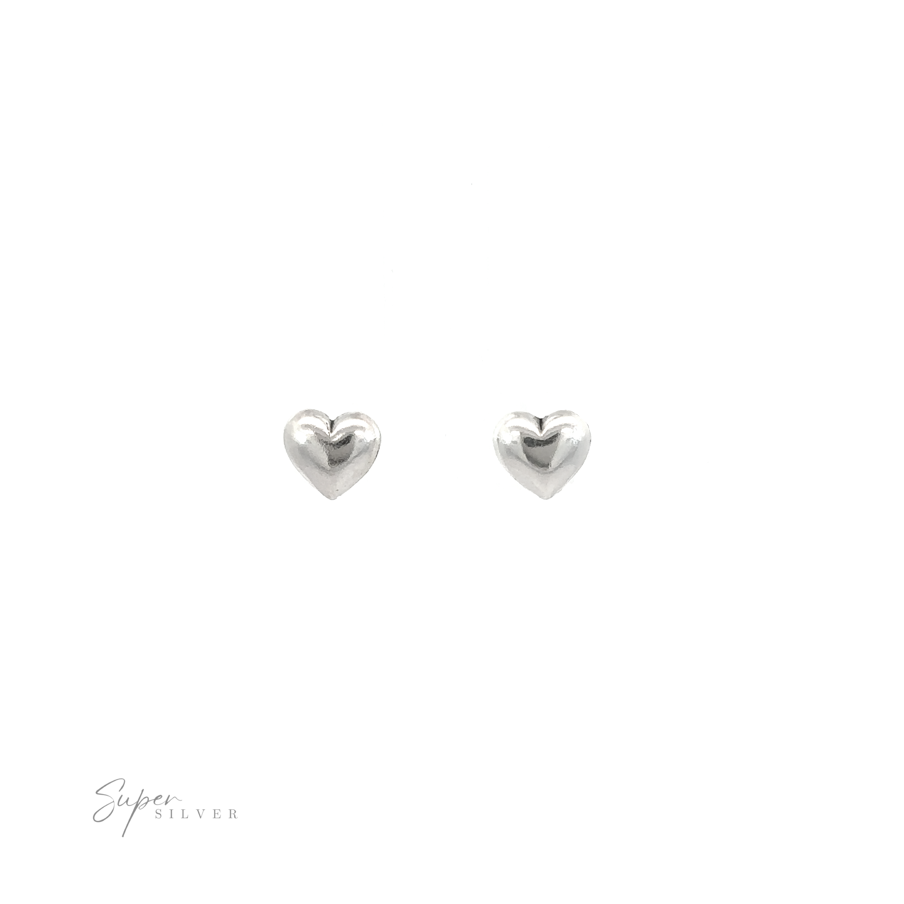 A pair of Simple Heart Studs on a white background, symbolizing love.