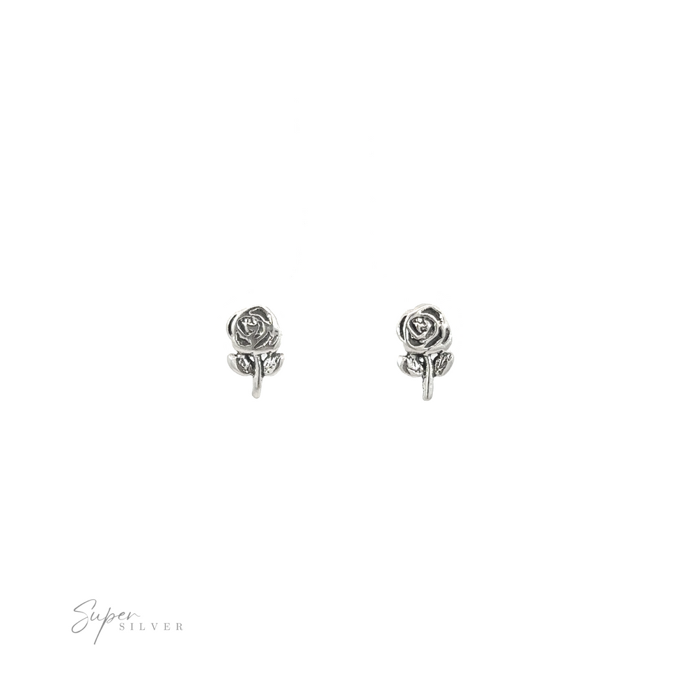 
                  
                    A pair of Rose Studs showcasing the beauty of nature on a white background.
                  
                