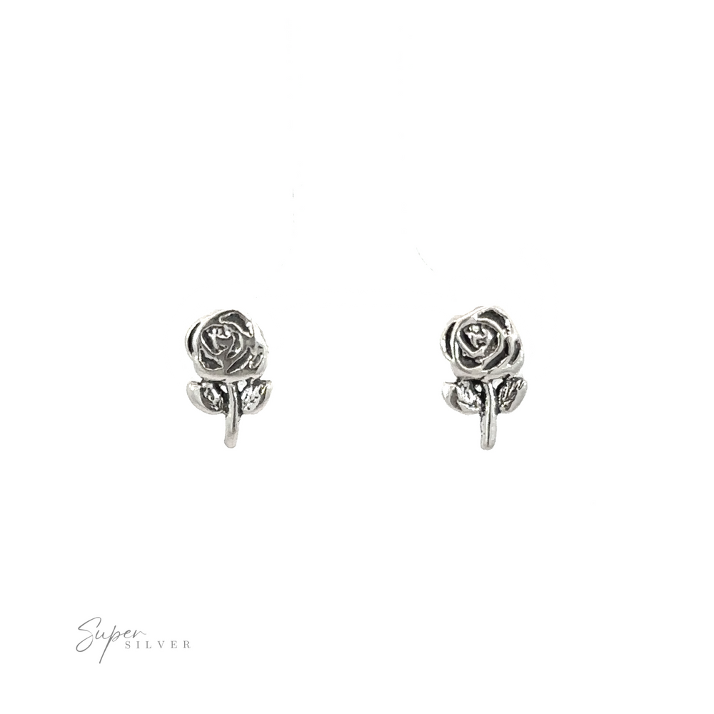A pair of Rose Studs showcasing the natural beauty of flowers on a white background.