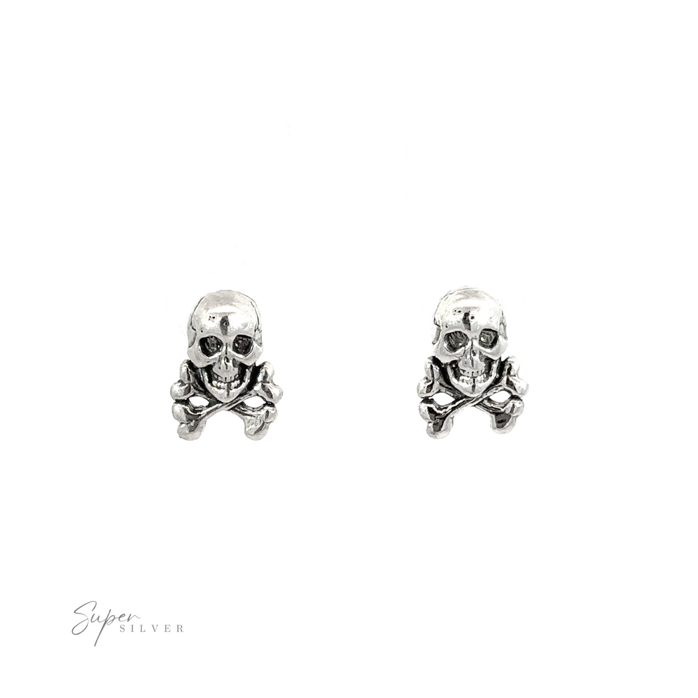 A pair of edgy Skull and Crossbones Studs made of .925 sterling silver, showcased on a white background.