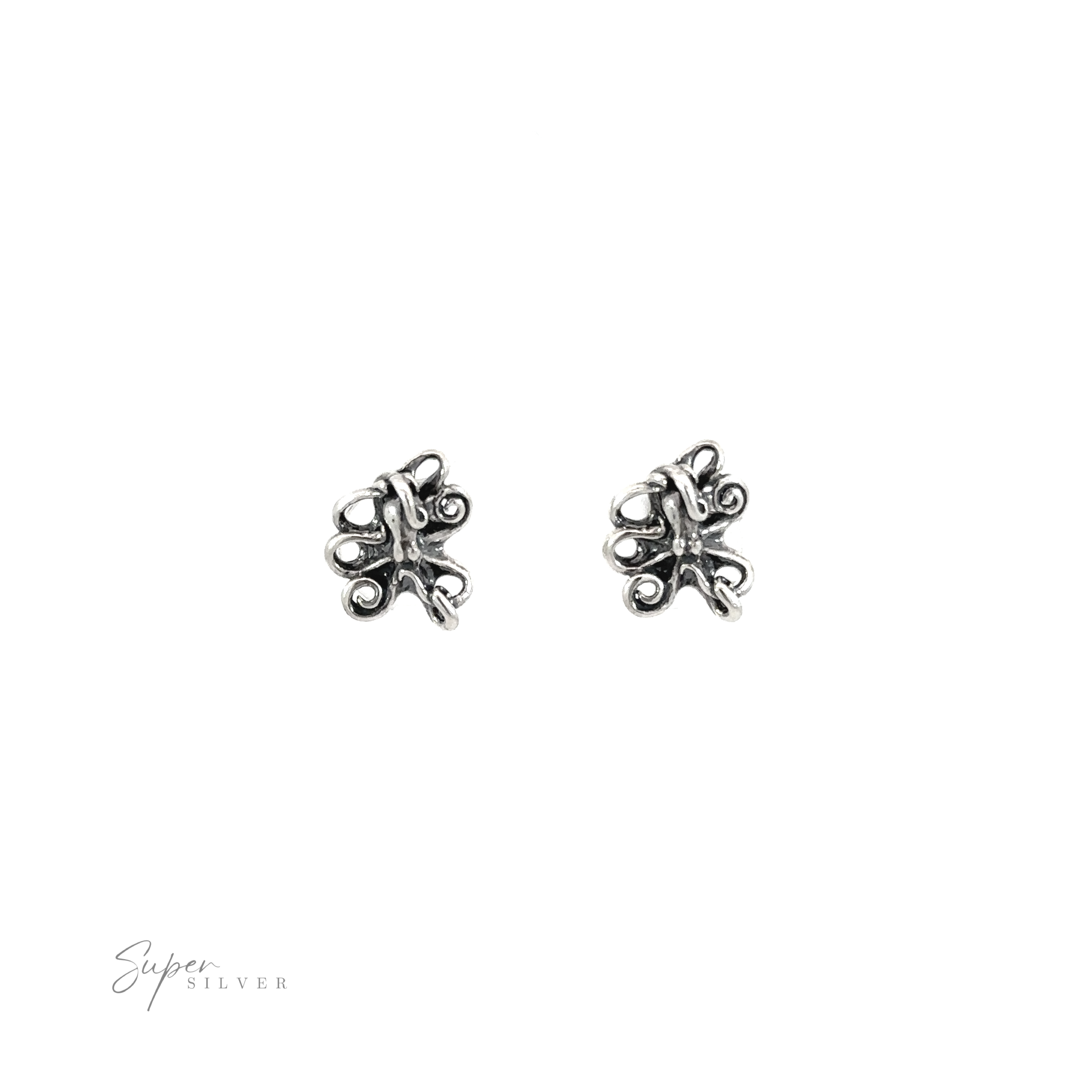 A pair of silver Intricate Octopus Studs featuring intricate octopus designs on a white background.