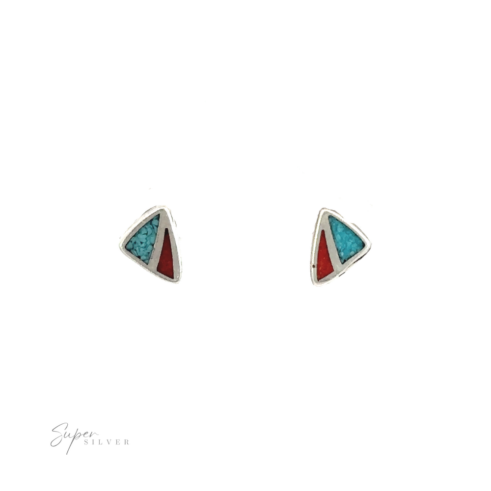 A pair of coral and turquoise triangle stud earrings on a white background.