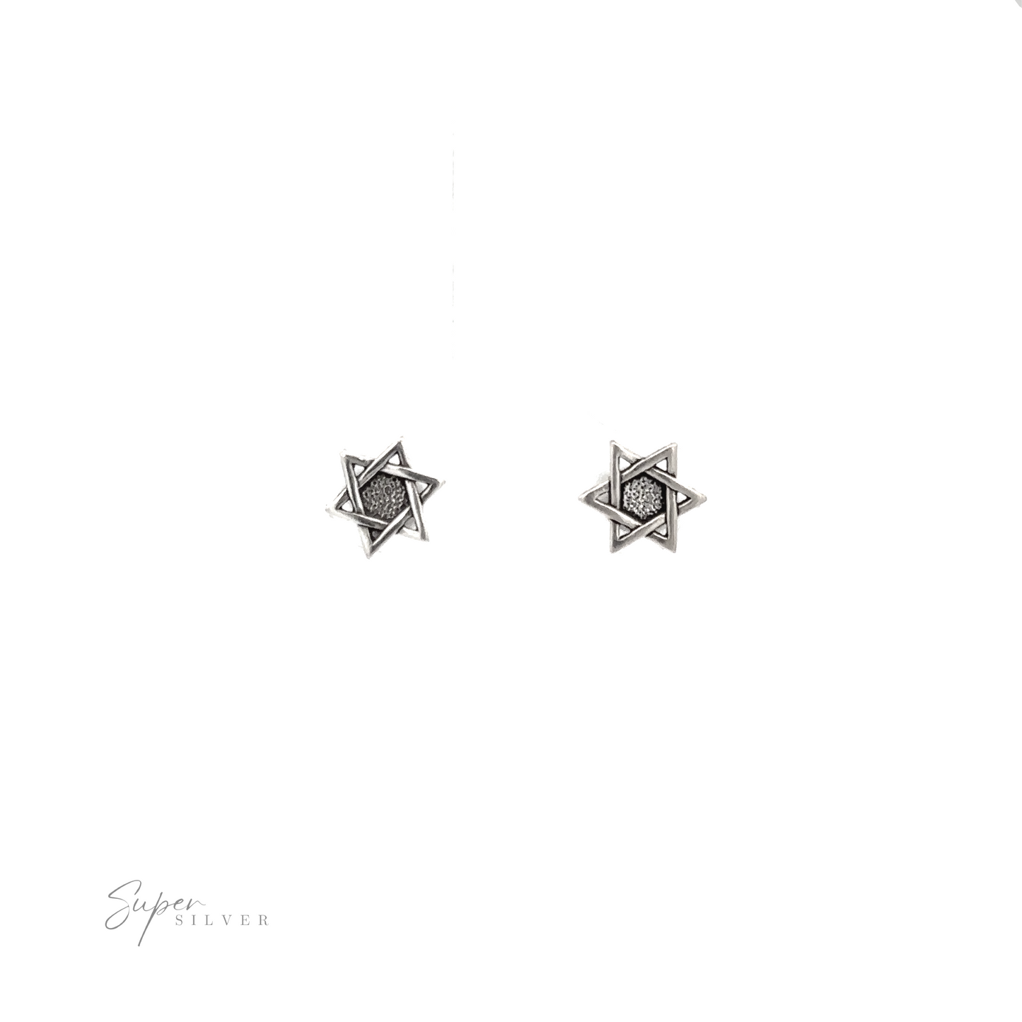 
                  
                    A pair of Star of David stud earrings on a white background.
                  
                