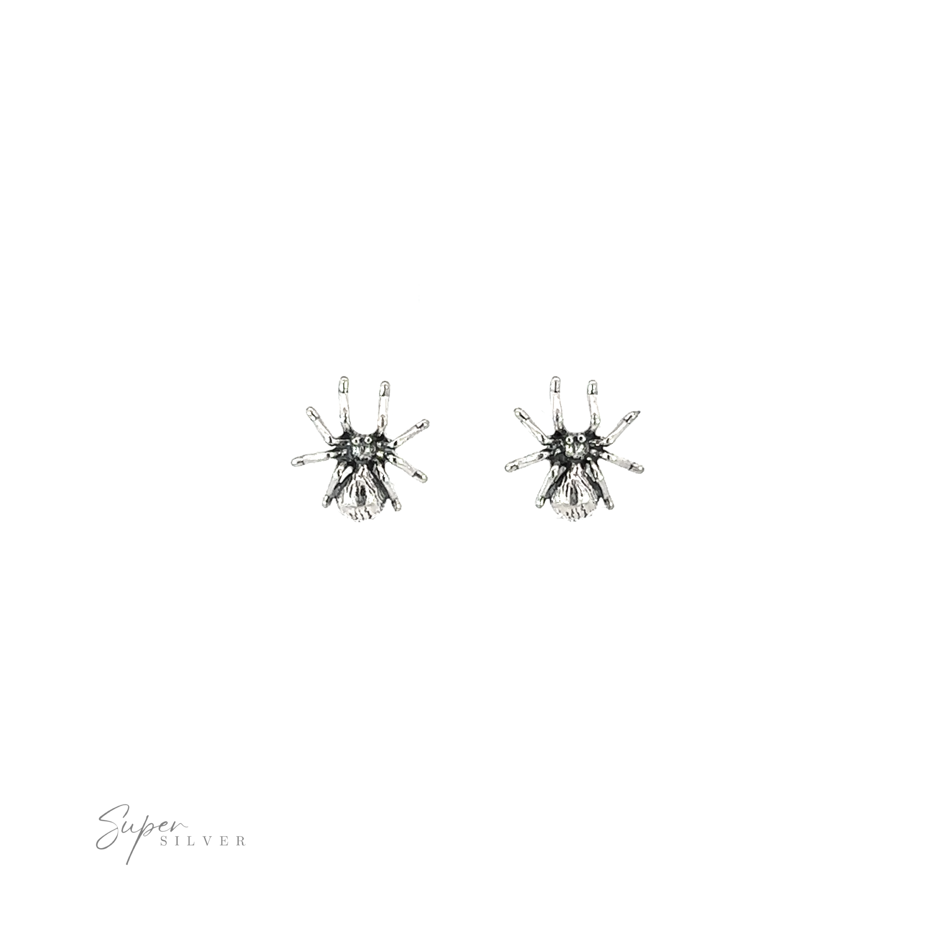 A pair of gothic Spider Studs on a white background.
