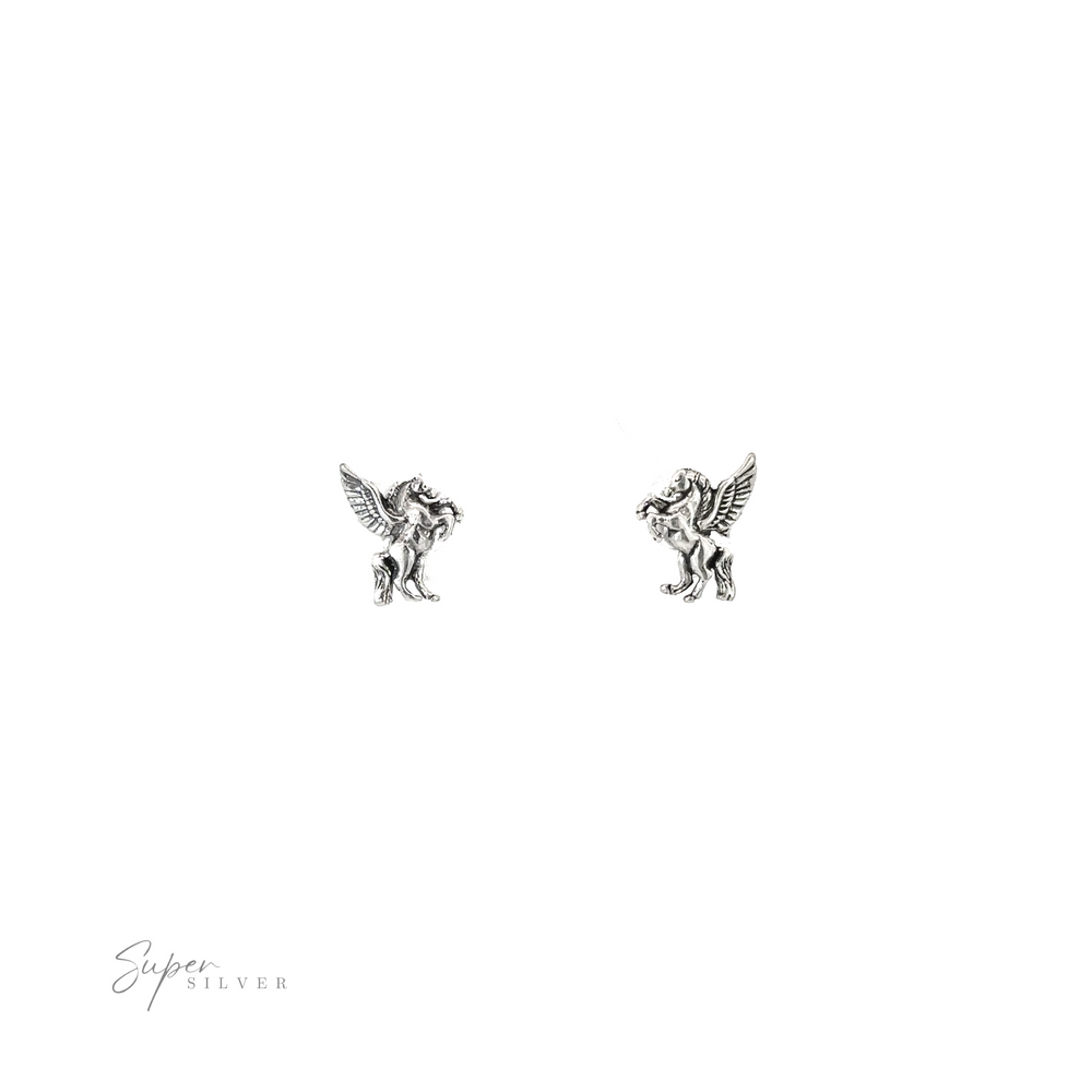 
                  
                    A pair of Pegasus Studs with angels on them.
                  
                