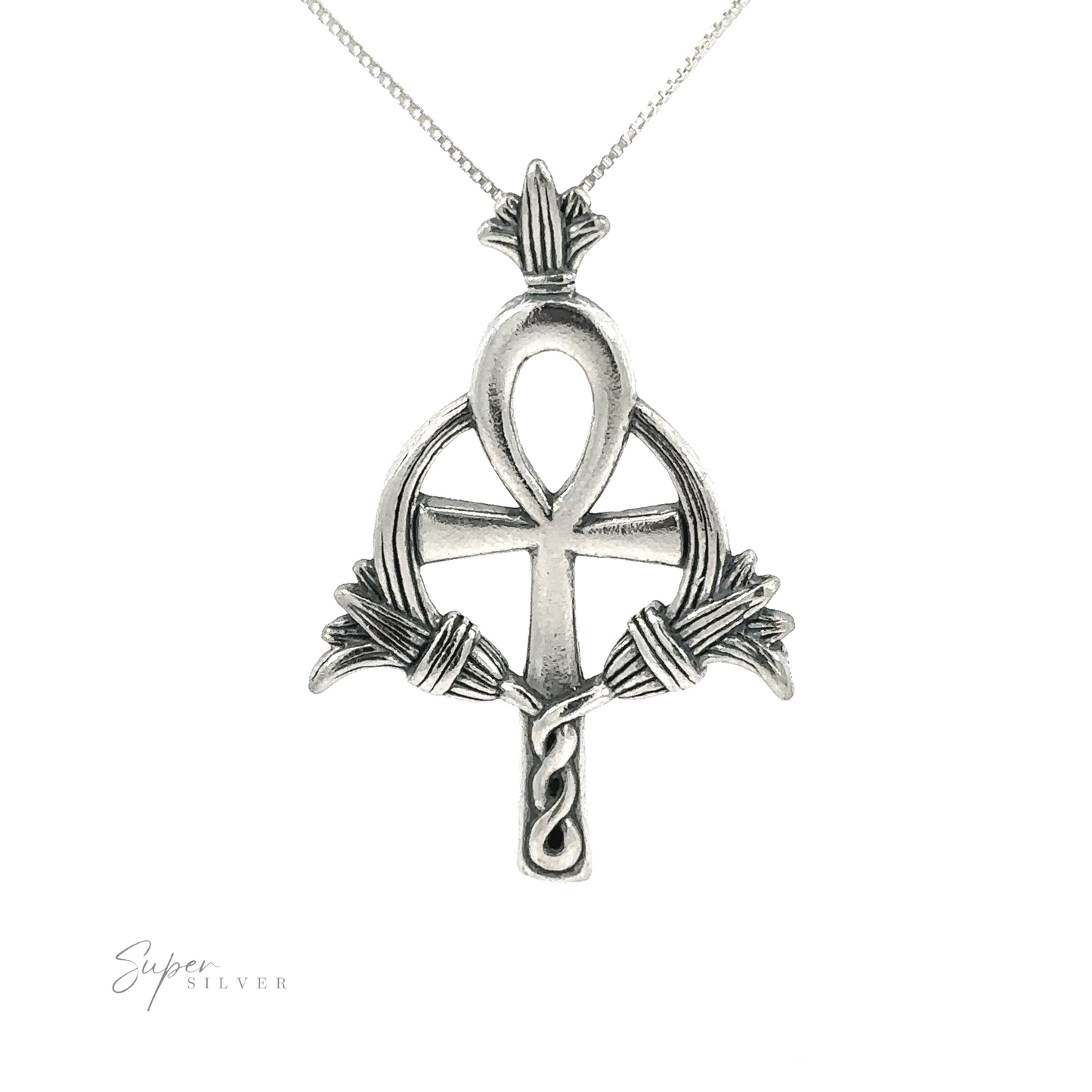 Egyptian embellished ankh pendant symbolizing eternal life in sterling silver.