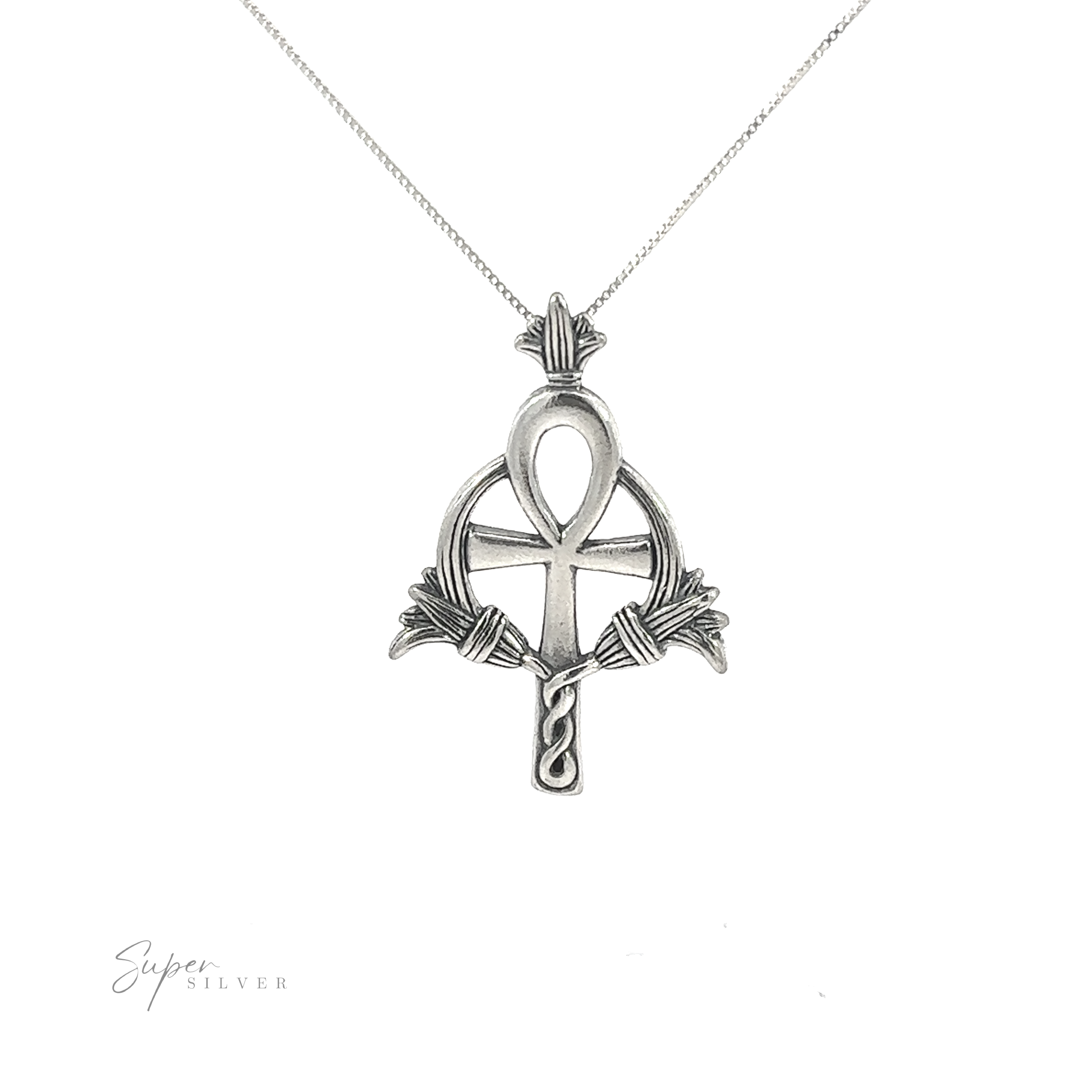 Embellished Ankh Pendant, symbolizing eternal life, in sterling silver.