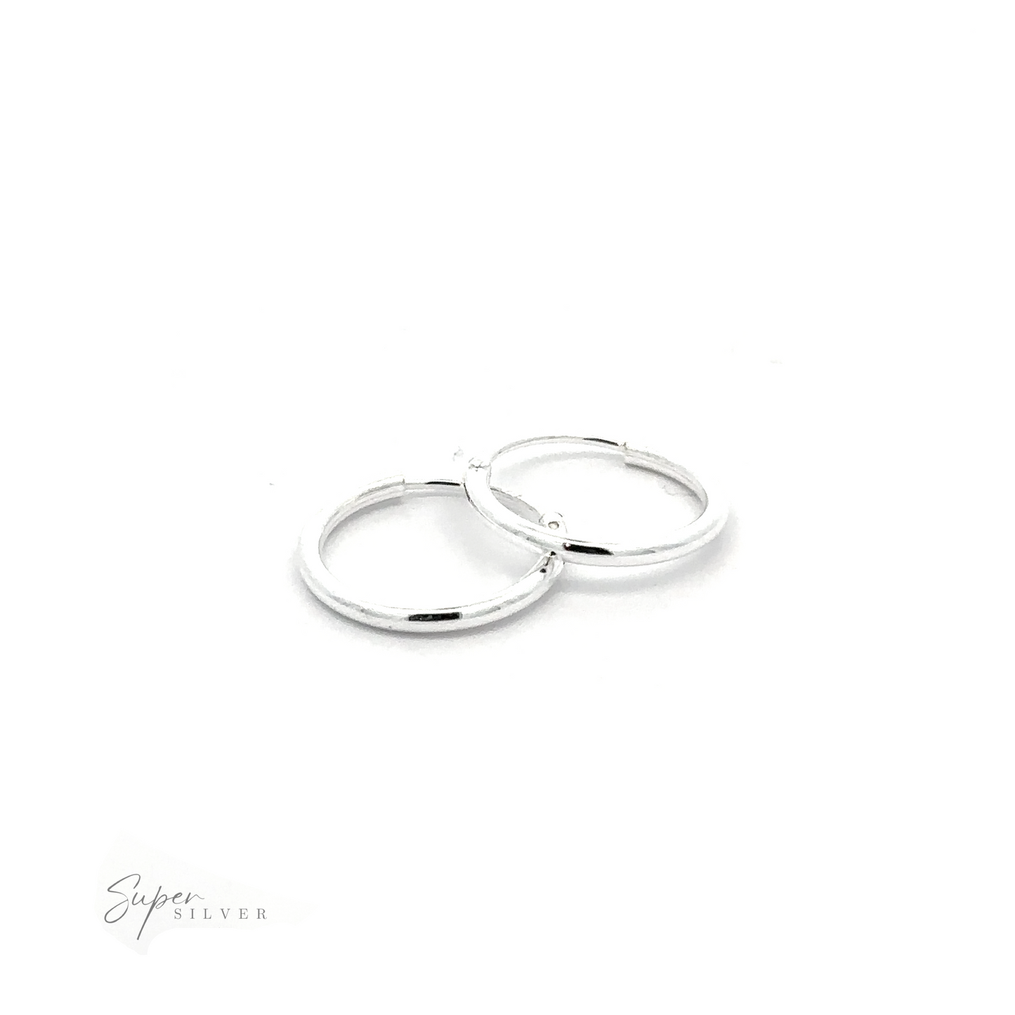 
                  
                    Two 1.2mm Infinity Hoops with a minimalist flair on a white background.
                  
                
