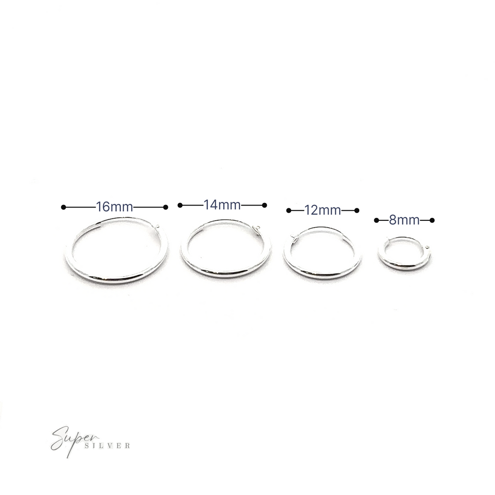 
                  
                    A set of versatile 1.2mm Infinity Hoops in different sizes, adding a minimalist flair to any outfit.
                  
                