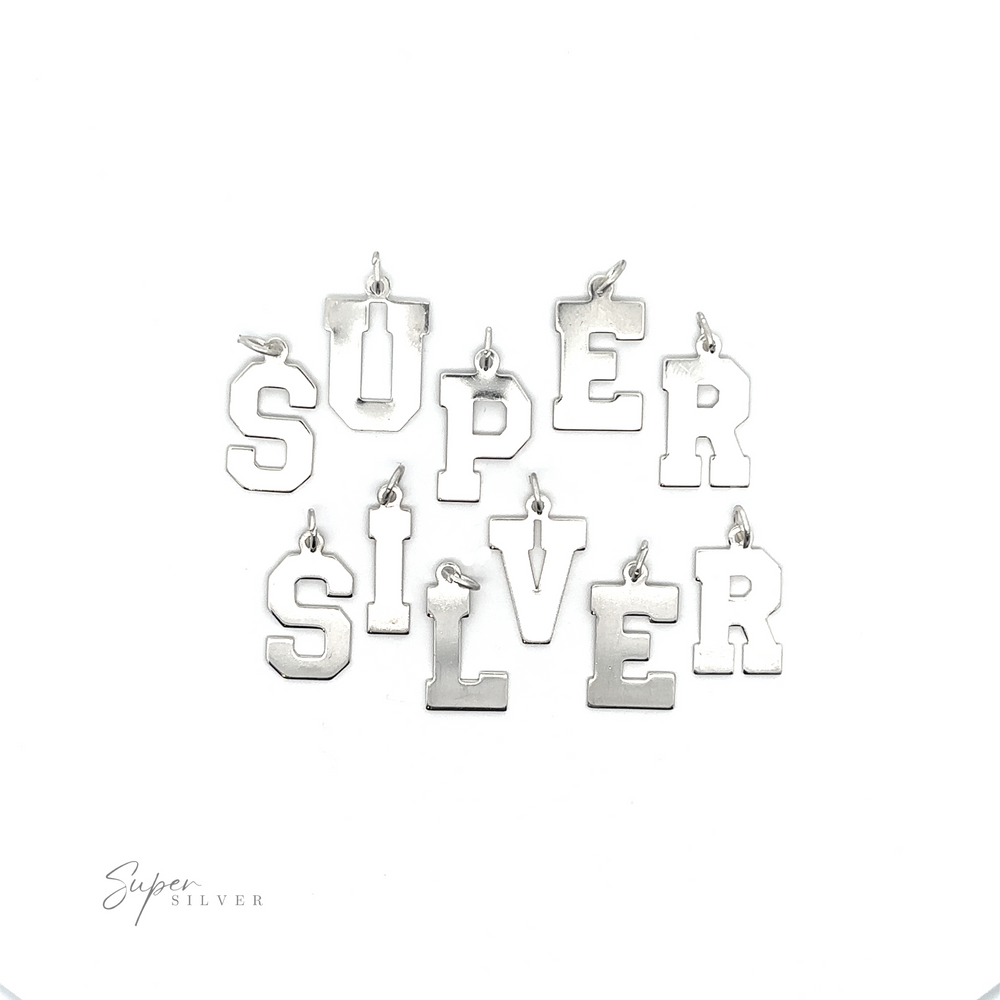 Create a personalized and stylish look with this set of .925 sterling silver Alphabet Charms. Spell out 