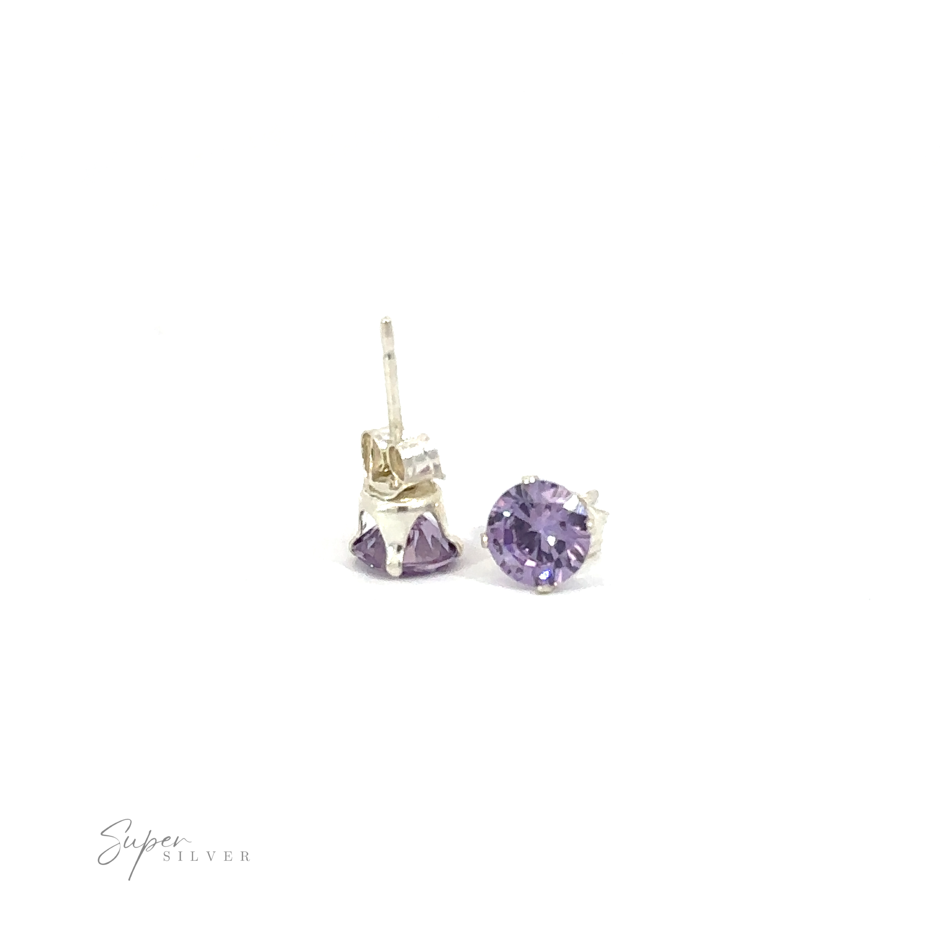 A pair of Round CZ Stud earrings with purple cubic zirconia gemstones on a white background.
