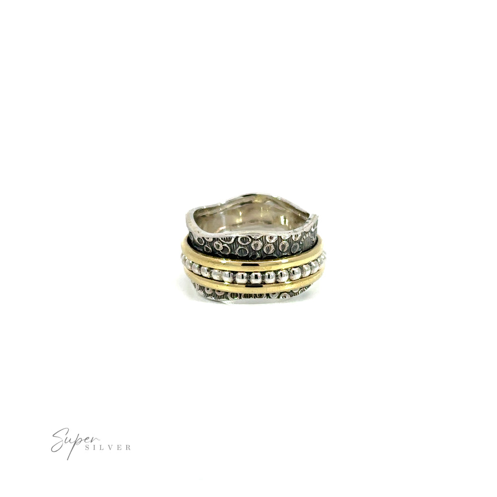 
                  
                    Description: A Octopus Scale Handmade Etched Spinner Ring with 2 Gold Bands and diamonds.
                  
                