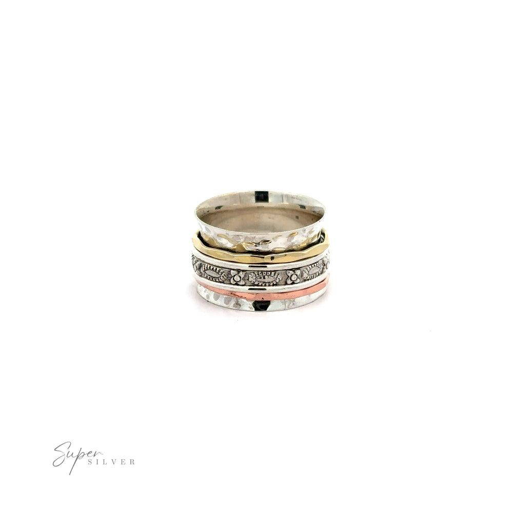 
                  
                    A stack of Tricolor Handmade Spinner Rings with A Flower Pattern Bands on a white background.
                  
                