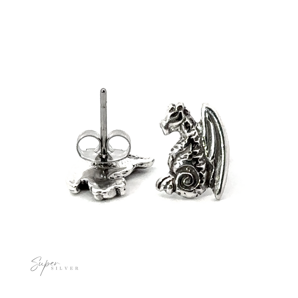 Sterling silver Dragon Studs on a white background.