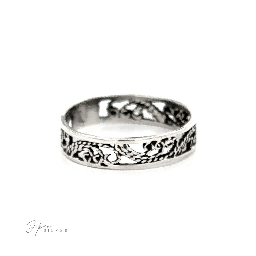 A Freestyle Filigree Band with an etched swirl design.