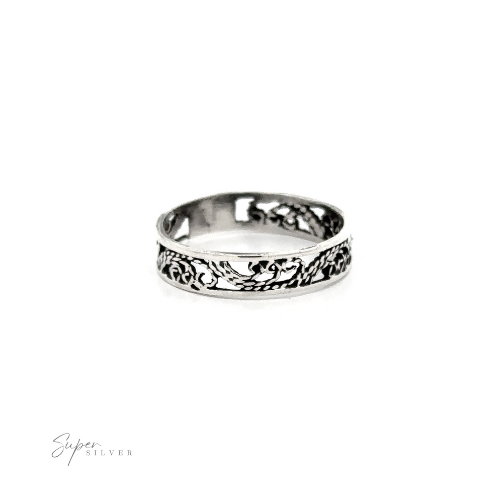 
                  
                    A silver ring with a Freestyle Filigree Band.
                  
                