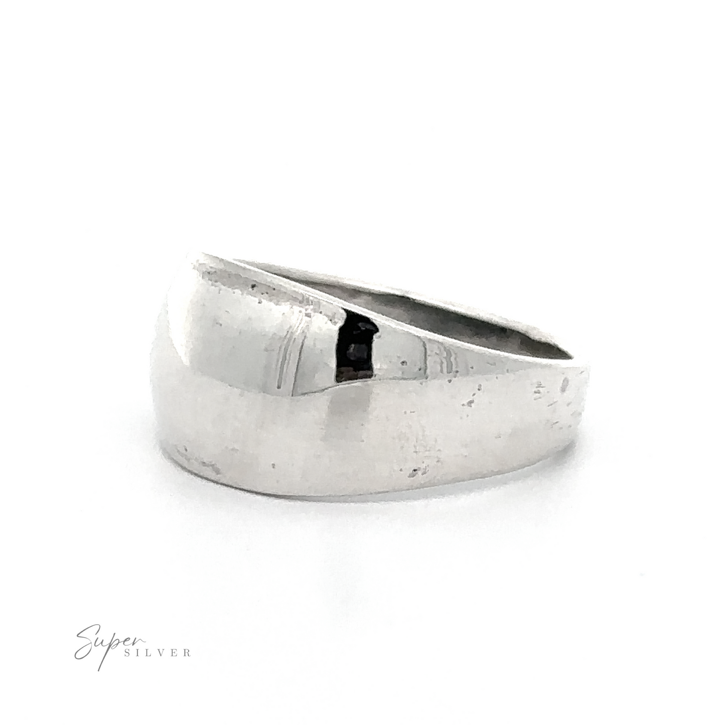 A contemporary Silver Dome Ring with a minimalist design on a white background.