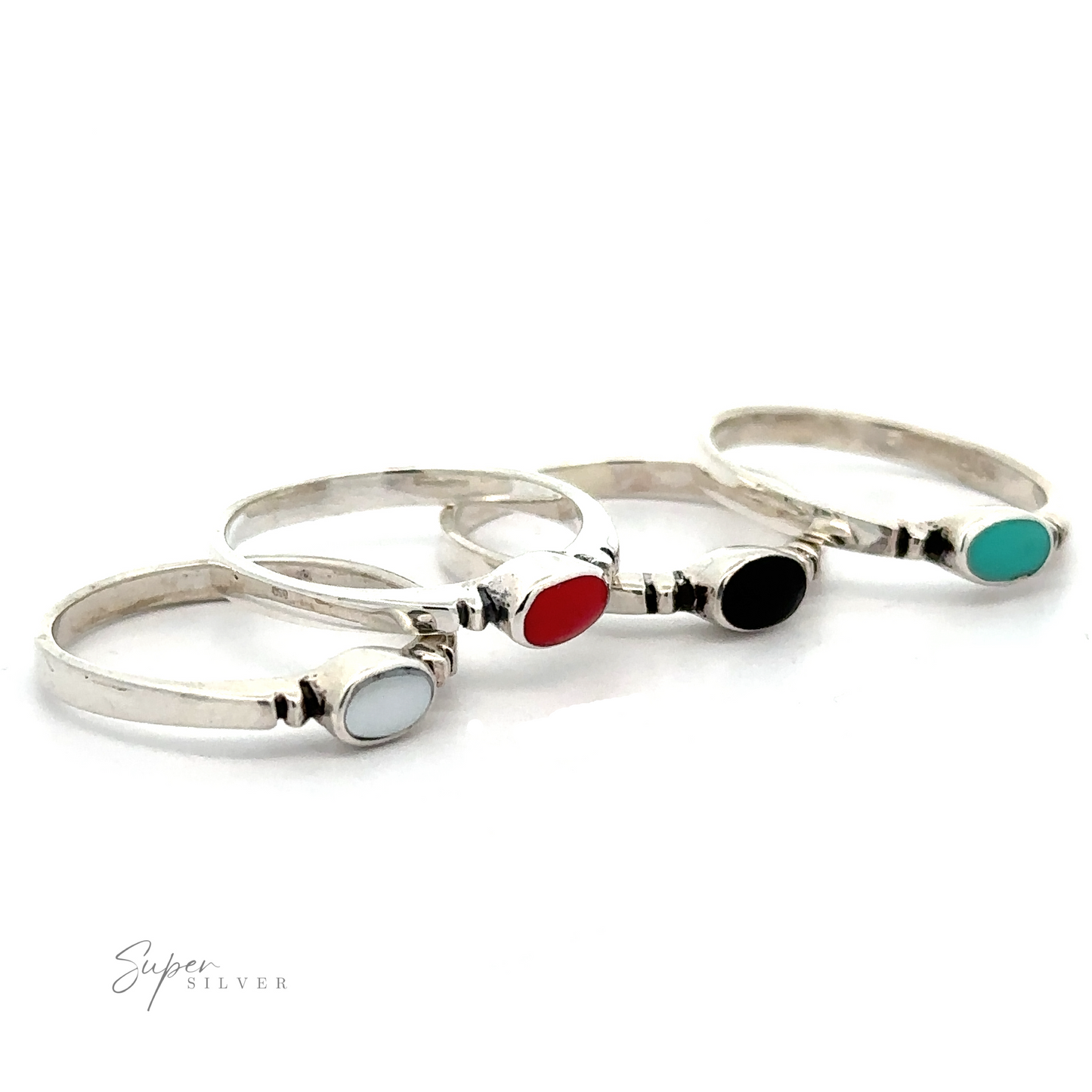 A set of four Small Horizontal Oval Inlay Rings with dainty and sleek design, featuring sideways oval stone rings in a minimalist style.