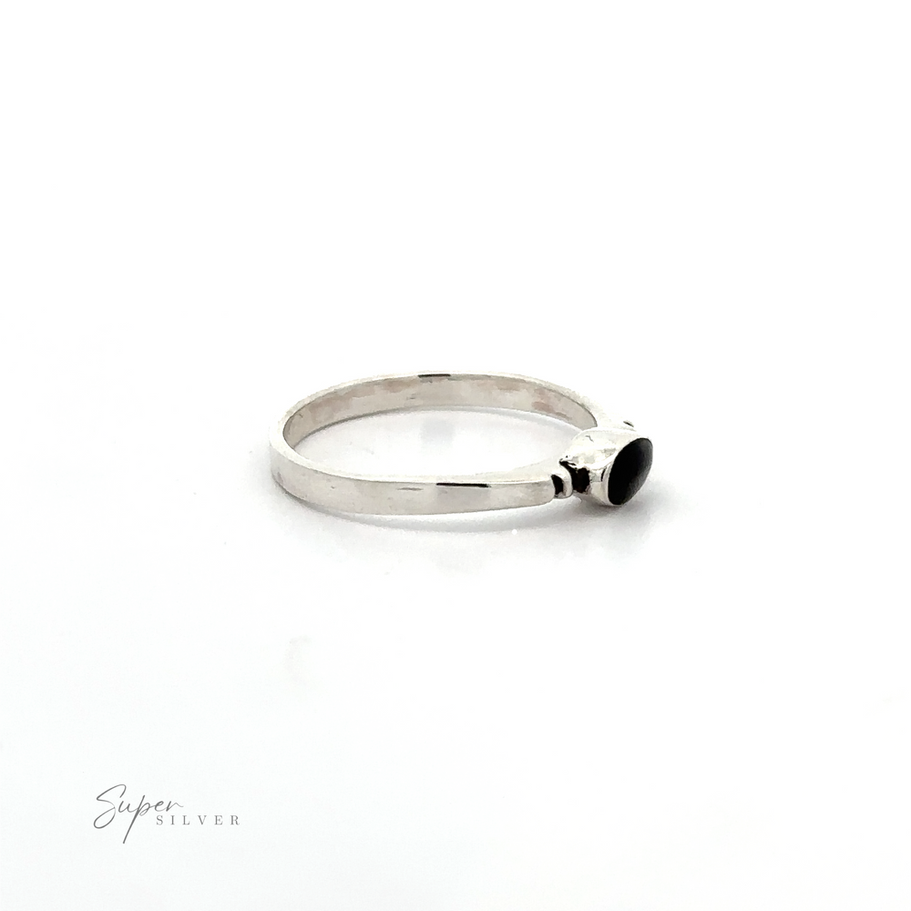 
                  
                    A dainty sterling silver Small Horizontal Oval Inlay Ring, in a minimalist style.
                  
                