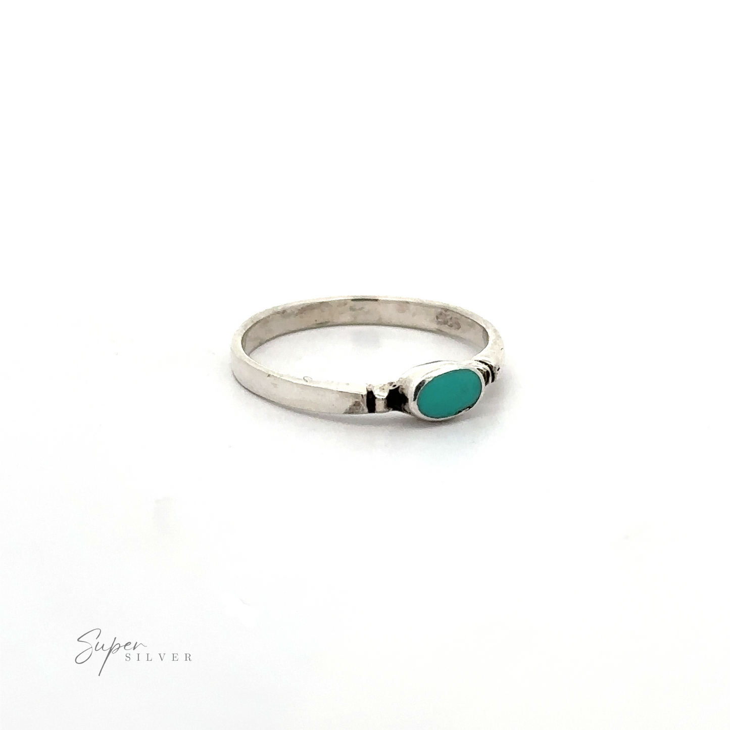 
                  
                    A dainty and sleek sterling silver ring with a Small Horizontal Oval Inlay turquoise stone.
                  
                