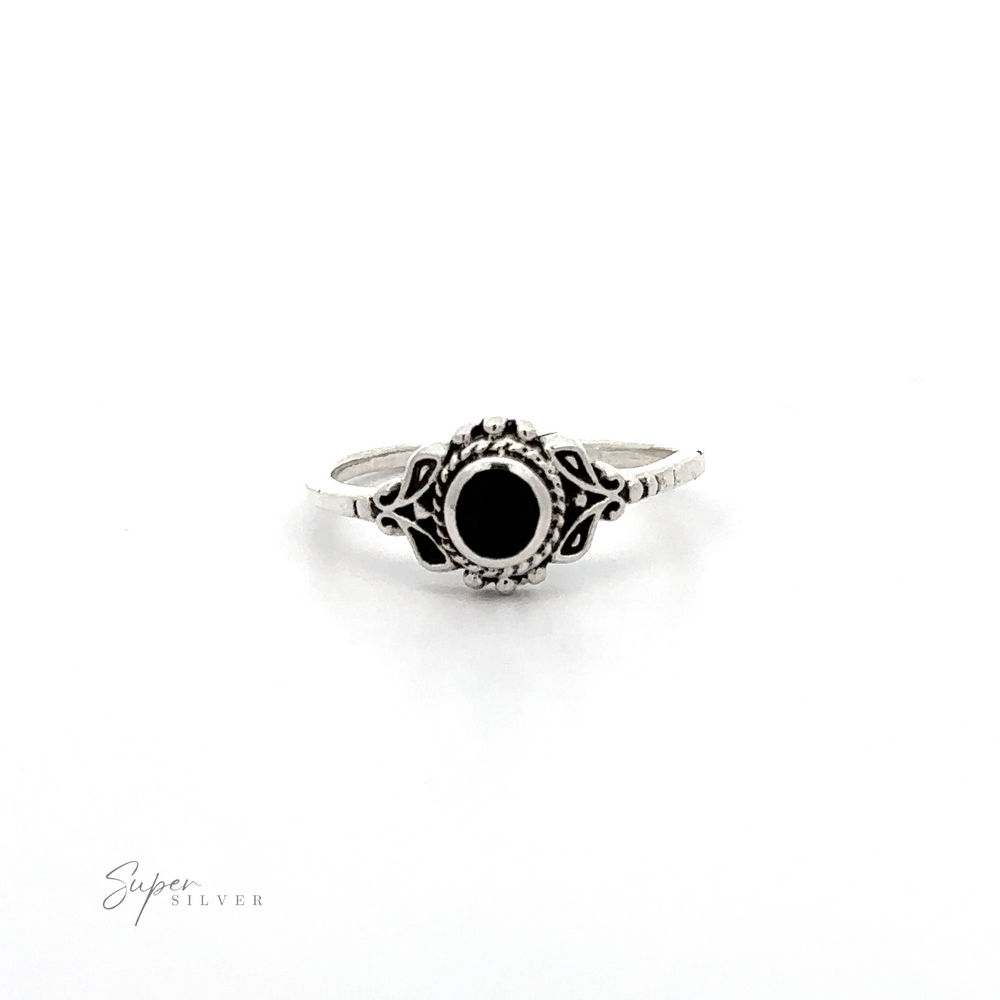 
                  
                    A Dainty Inlaid Stone Ring with Filigree with a black onyx stone.
                  
                