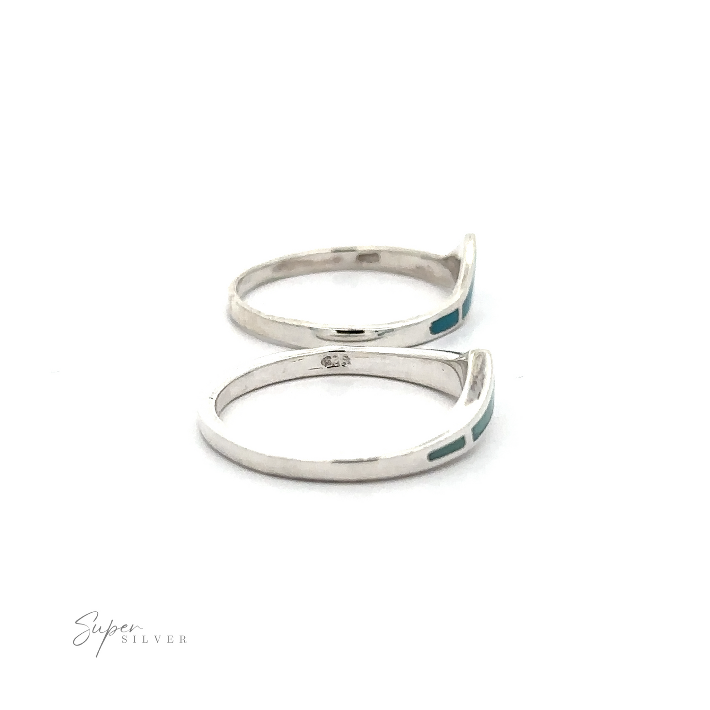 
                  
                    A trendy chevron ring with inlaid stones.
                  
                