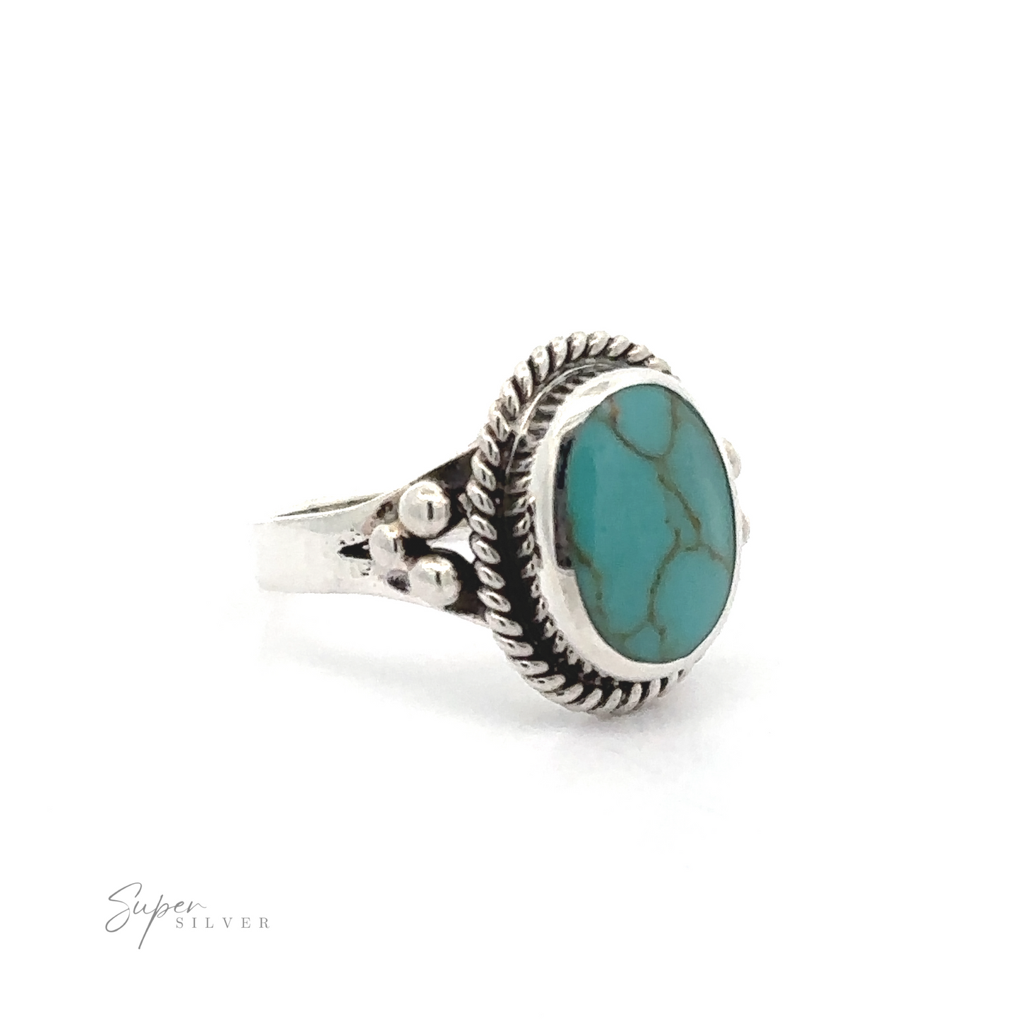 
                  
                    A sterling silver oval ring with a rope setting and inlaid blue stones.
                  
                