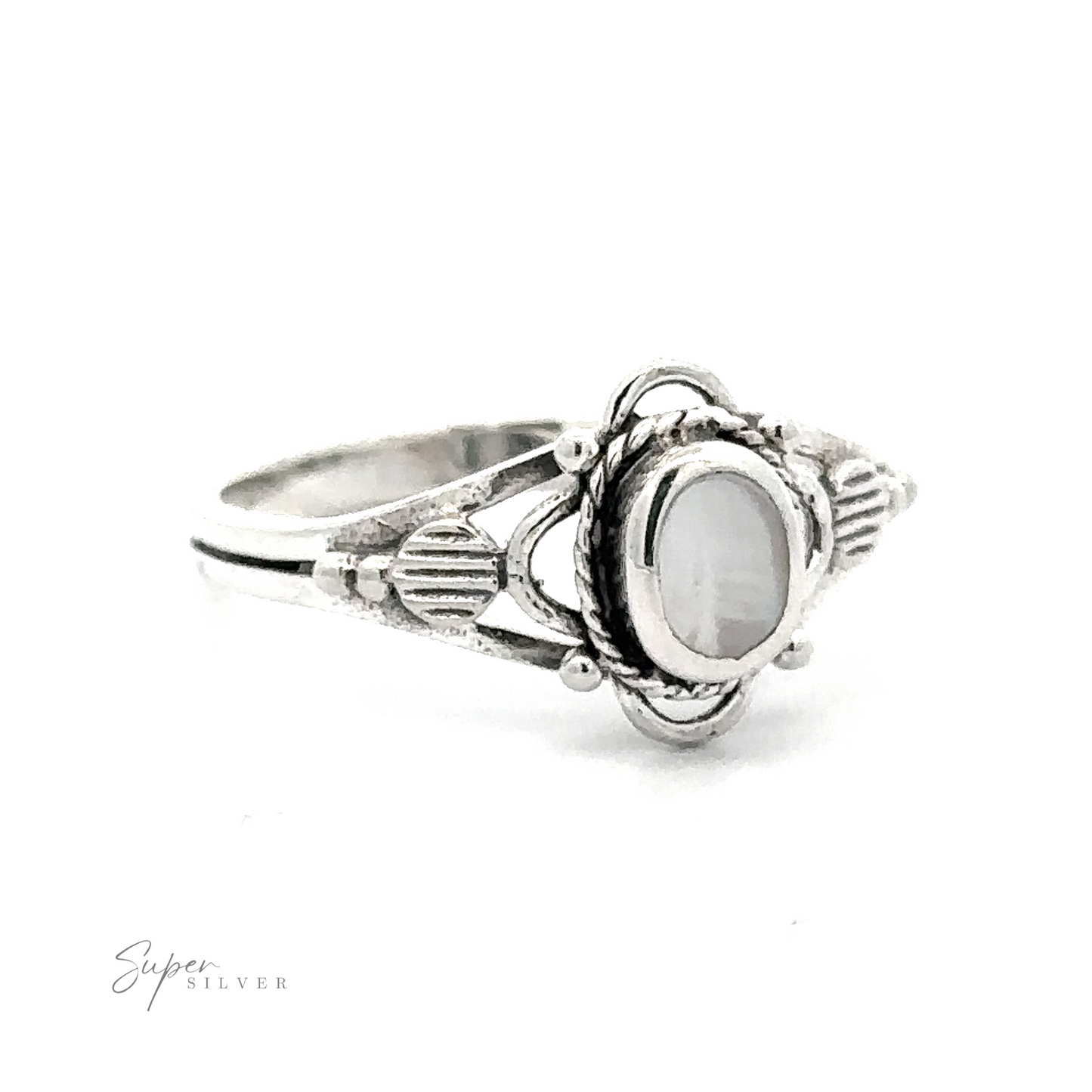 
                  
                    A silver Fancy Oval Inlay Stone ring with a white mother of pearl stone.
                  
                