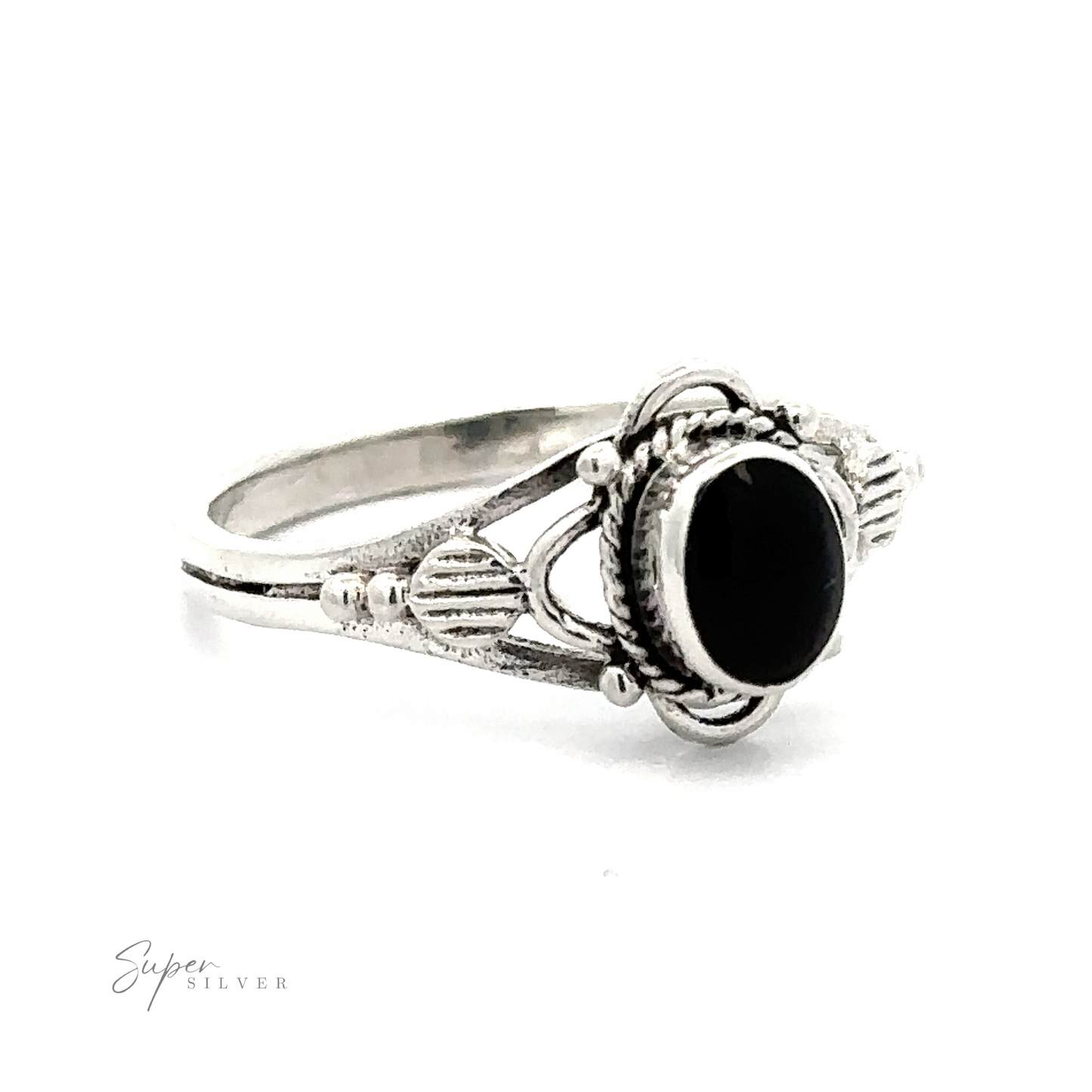 
                  
                    A vintage silver ring with a Fancy Oval Inlay Stone.
                  
                