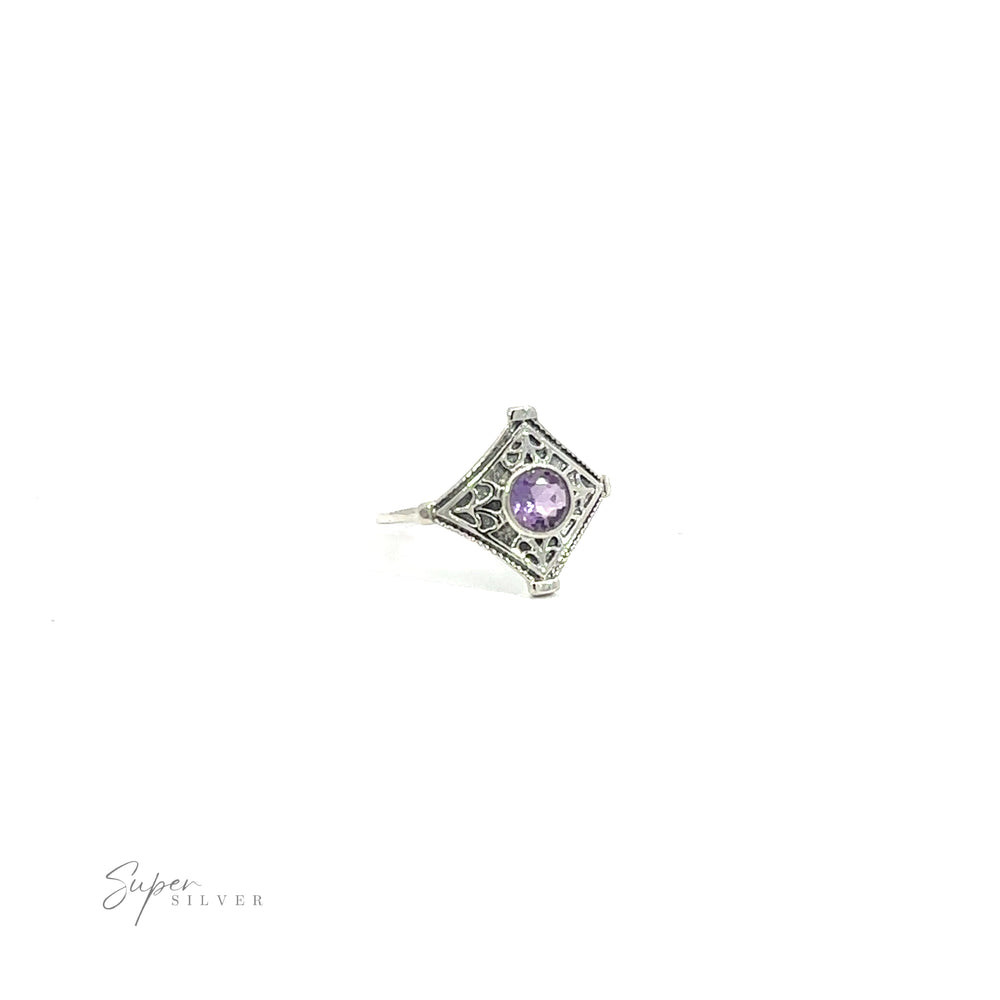 
                  
                    Intricate Diamond Silver Ring with a Round Gemstone featuring a central purple gemstone, displayed on a white background with ".925 Sterling Silver" signature in the corner.
                  
                