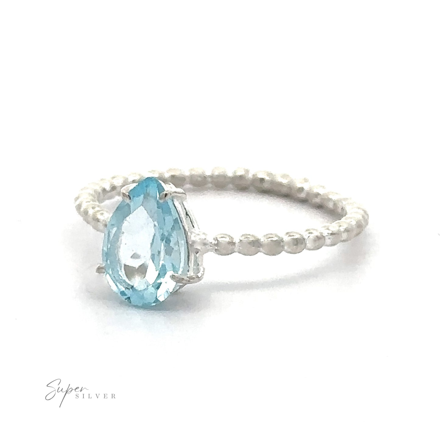 
                  
                    A Vibrant Teardrop Gemstone ring with a teardrop-shaped blue gemstone on a white background.
                  
                