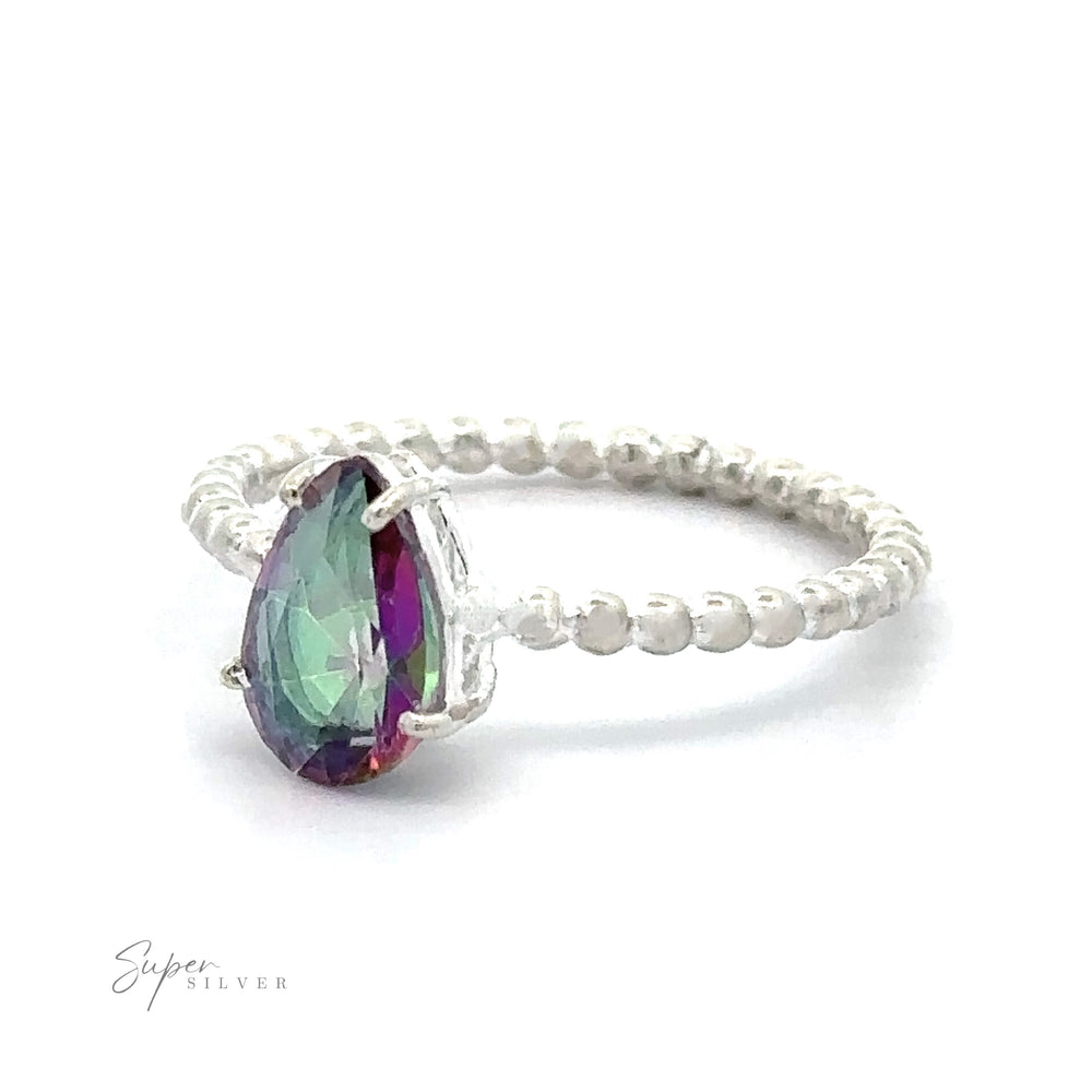 
                  
                    Vibrant Teardrop Gemstone Ring with Beaded Band made of .925 Sterling Silver on a white background.
                  
                